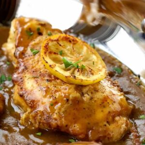 Chicken Francese recipe in a skillet with sauce